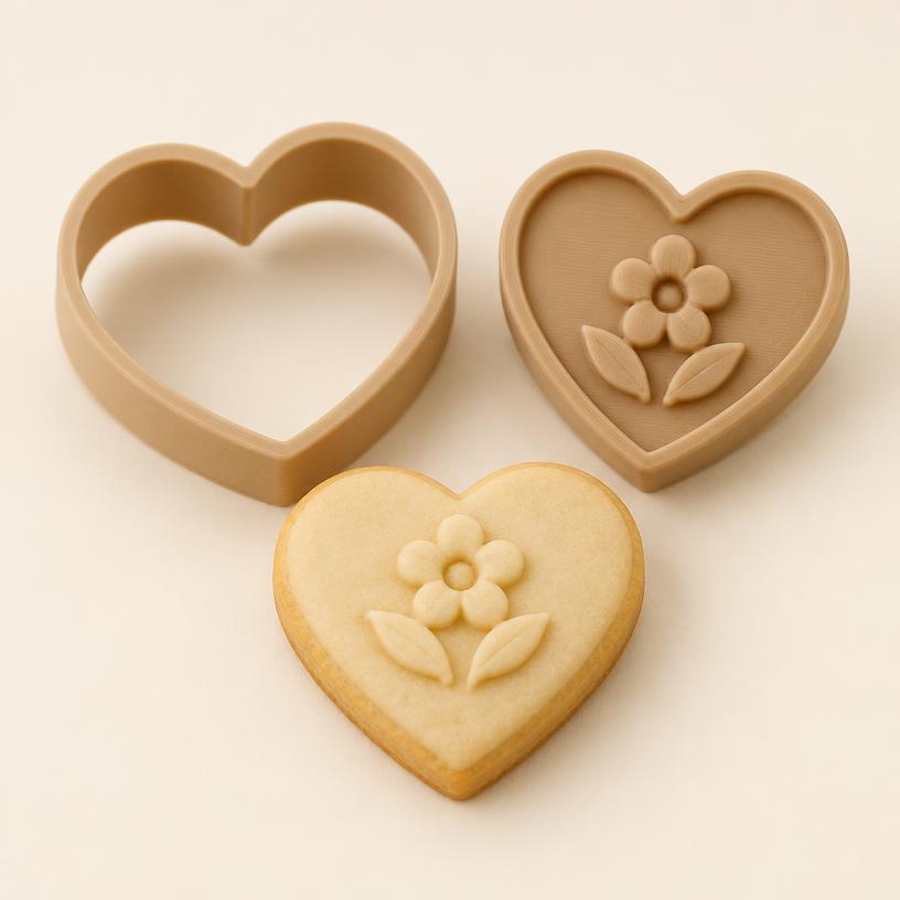 Heart cookie cutter with its matching flower stamp and cookie